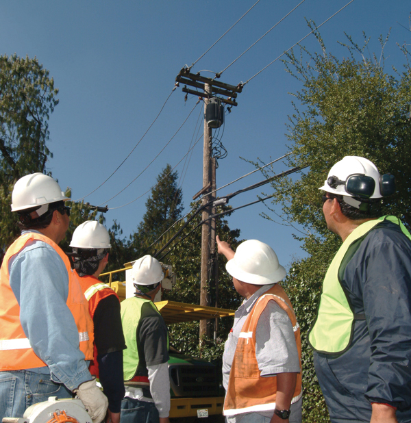 Construction workers examining site